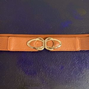 Vintage ochre burnt orange belt with gold clasp elastic 35” - 52”